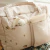 Bolso maternal limón - Konges en internet