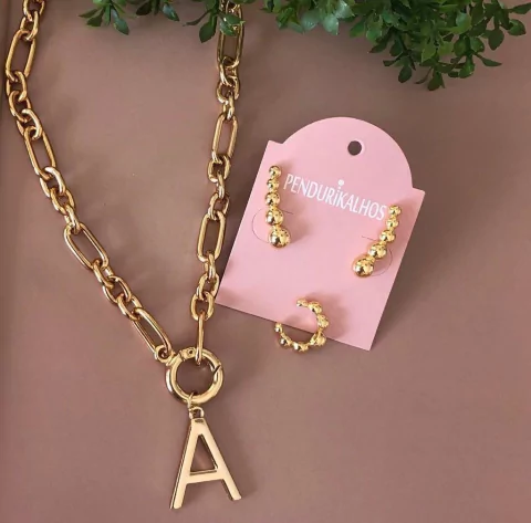 Cl 0178-1: Corrente dourada com letra