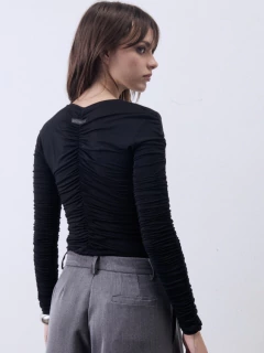 REMERA FRUNCE TUMERIC en internet