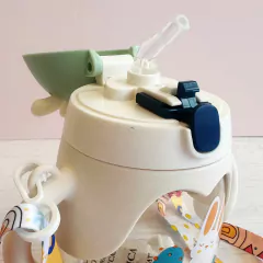 Botella infantil con manija conejo - comprar online