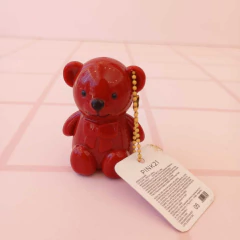 Pintura labial osito con cadena en internet