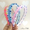 Tiara pomponzinhos fofinhos