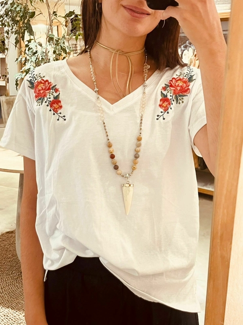 REMERA ME COMPRO MIS FLORES