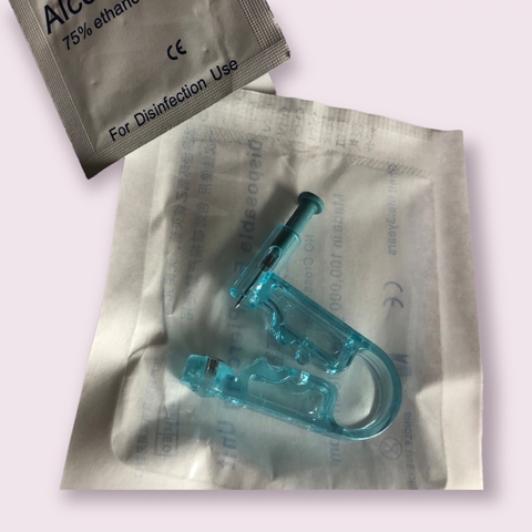 máquina perforadora de orejas + aro abridor