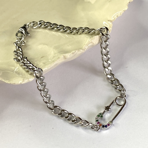 Pu 735 grumet con alfiler de gancho Strass color