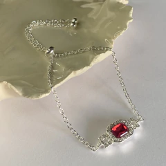 Pu 911p corrediza con piedra roja