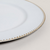 PLATO DE SITIO WHITE & GOLD PUNTOS 33 CM en internet