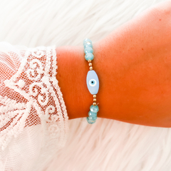PULSERA CRISTALES CELESTES, OJO Y COLIBRÍ